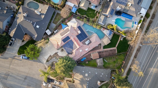 birds eye view of property with a residential view