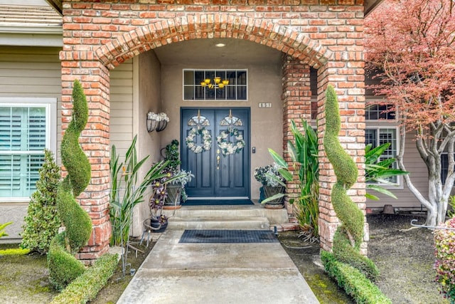 851 E Country View Cir, Fresno, CA 93730 - view of exterior entry with stucco siding and brick siding