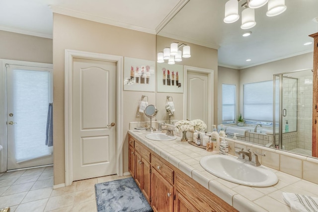 bathroom with a sink, ornamental molding, and a shower stall