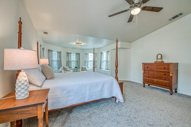 carpeted bedroom with visible vents, baseboards, and a ceiling fan