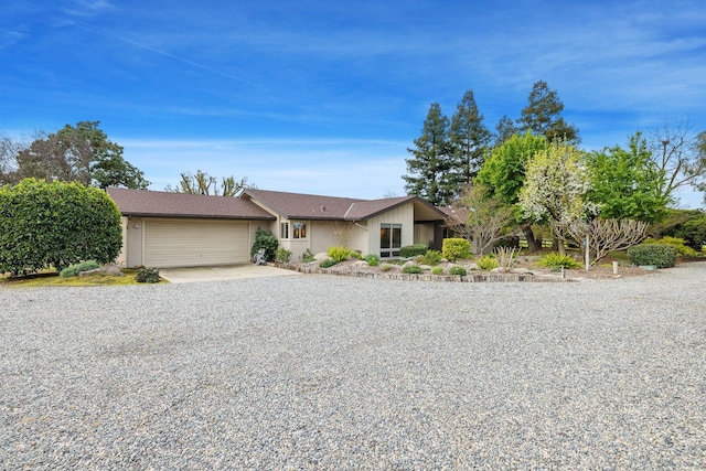 view of front of property with an attached garage and driveway