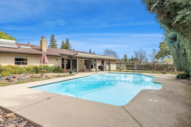 view of pool featuring fence, a patio area, and a fenced in pool