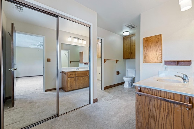 full bathroom with visible vents, baseboards, and vanity