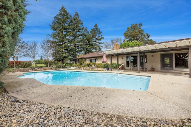 outdoor pool with a patio