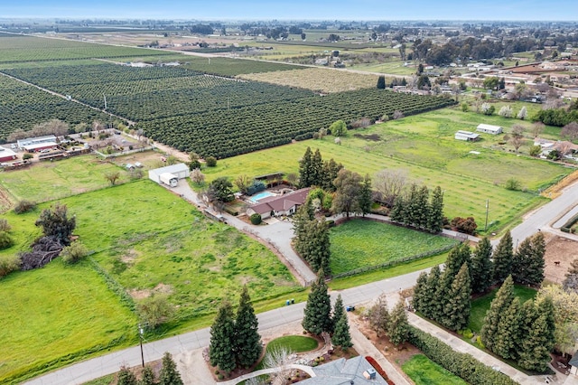 birds eye view of property featuring a rural view