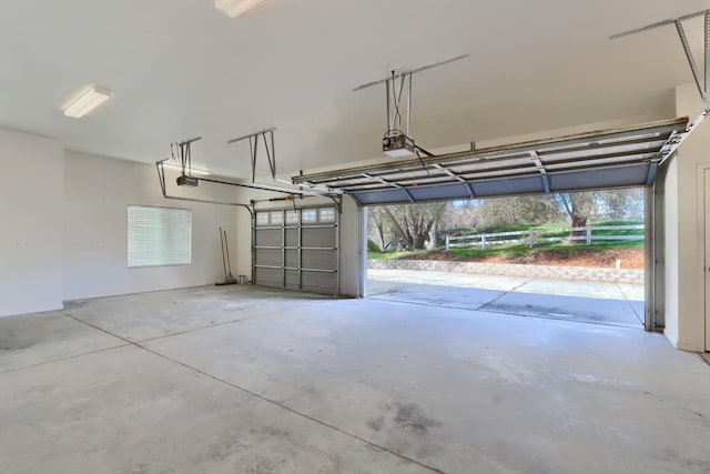 garage featuring a garage door opener