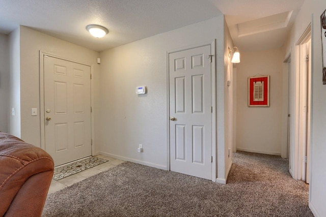 29878 Deer Trail Ln, Coarsegold, CA 93614 - foyer featuring light tile patterned floors, light colored carpet, and baseboards