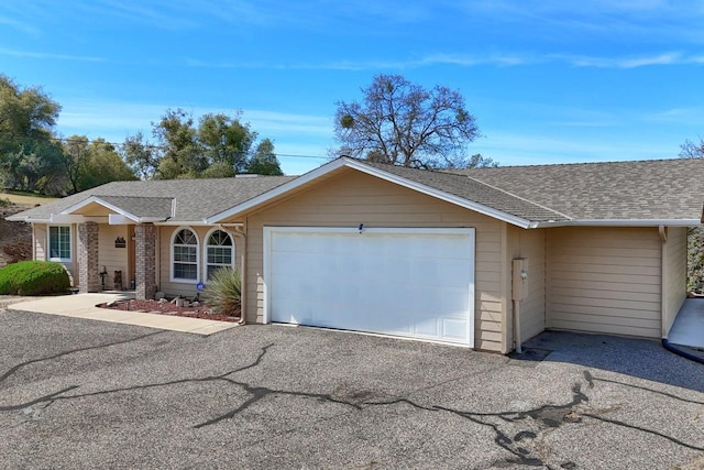29878 Deer Trail Ln, Coarsegold, CA 93614 - single story home with a garage, driveway, and a shingled roof