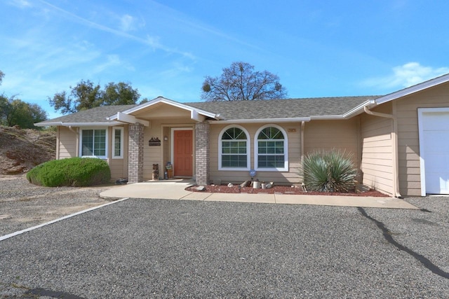 29878 Deer Trail Ln, Coarsegold, CA 93614 - ranch-style home featuring an attached garage and a shingled roof
