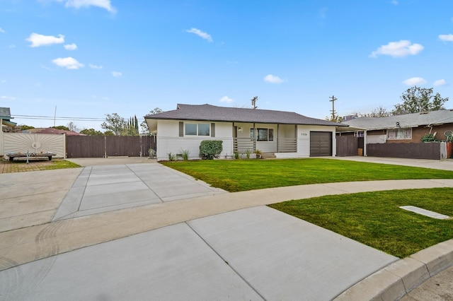 ranch-style home with stucco siding, a front lawn, fence, concrete driveway, and a garage