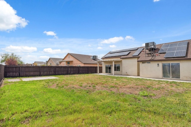 view of yard featuring a patio, cooling unit, and a fenced backyard