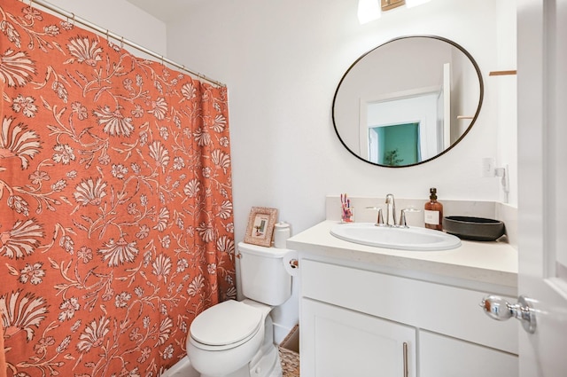 full bath featuring curtained shower, toilet, and vanity