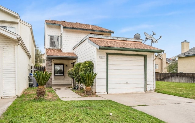 3622 W Terrace Ave, Fresno, CA 93722 - view of front facade featuring concrete driveway and a garage