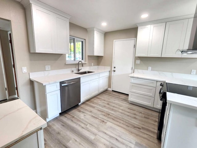 kitchen with light wood-style flooring, dishwasher, range with electric stovetop, and a sink