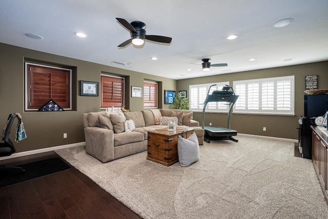 living area with recessed lighting, baseboards, light wood-style floors, and a ceiling fan