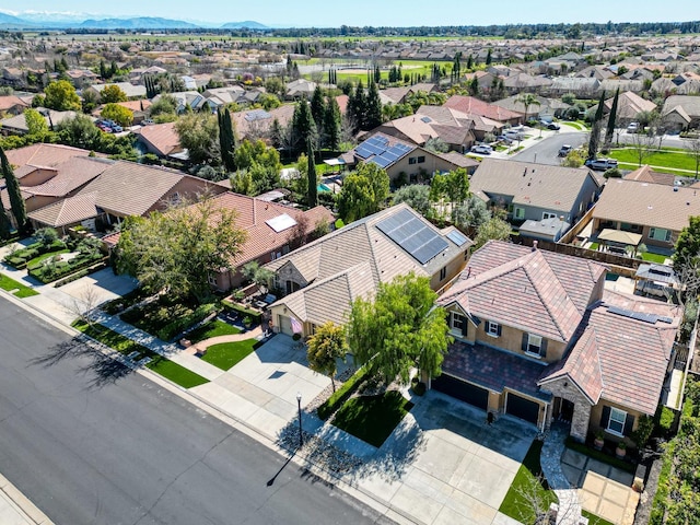 birds eye view of property with a residential view