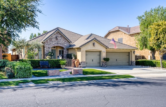 view of front of property with stone siding, concrete driveway, a garage, and fence