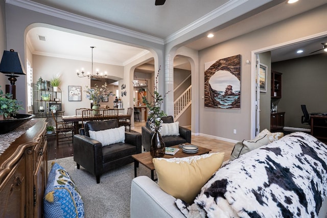 living area featuring recessed lighting, visible vents, baseboards, and crown molding