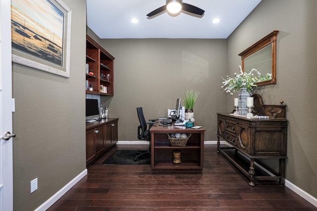 office with ceiling fan, baseboards, and dark wood finished floors