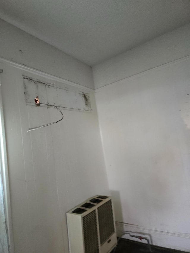 interior space with a wall mounted AC