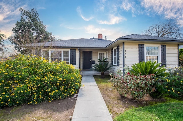 107 W Garland Ave, Fresno, CA 93705 - view of front of house featuring a chimney