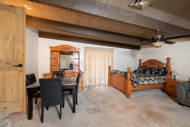 bedroom with beam ceiling, wood ceiling, and light carpet