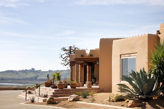 view of home's exterior with stucco siding