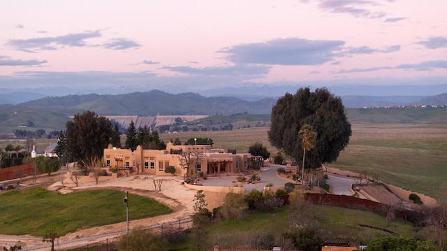 view of mountain feature with a rural view