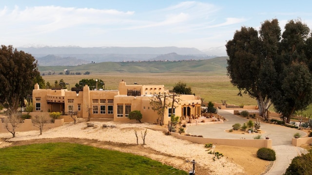 property view of mountains with a rural view