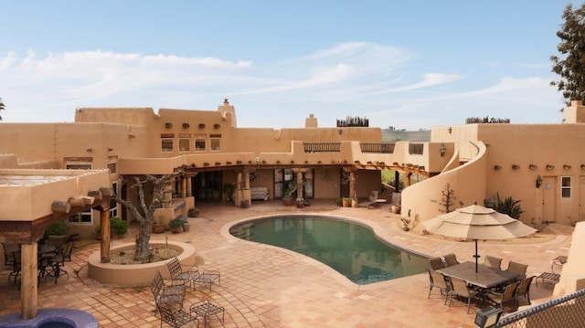 pool with a patio area