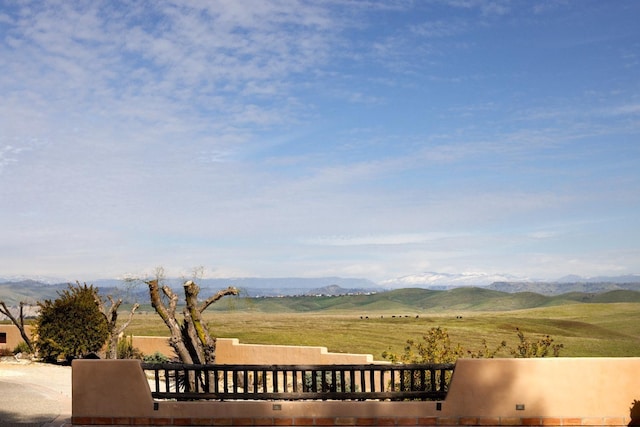 view of mountain feature with a rural view