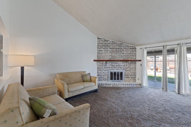 living area featuring a textured ceiling, a brick fireplace, carpet flooring, and vaulted ceiling