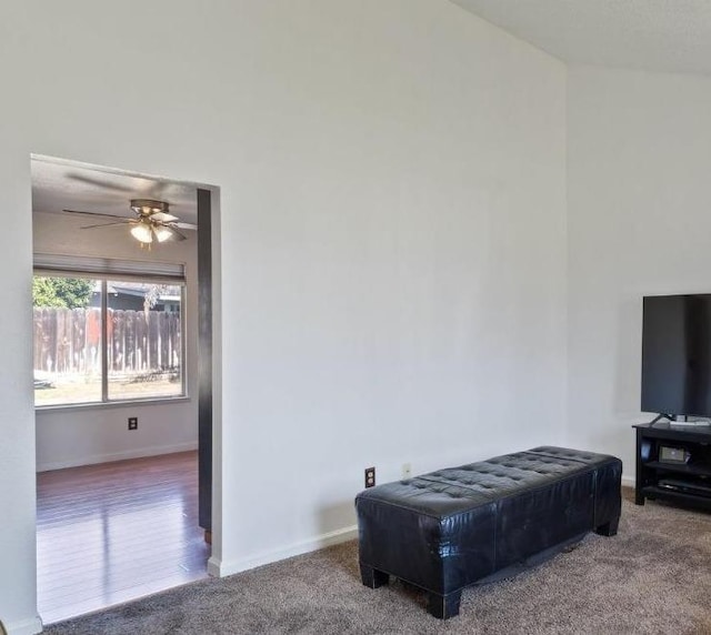 carpeted bedroom featuring baseboards