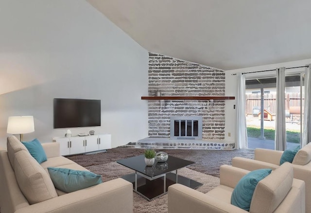 living room featuring a fireplace and vaulted ceiling