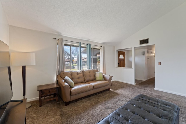 living room featuring visible vents, carpet flooring, a textured ceiling, and vaulted ceiling