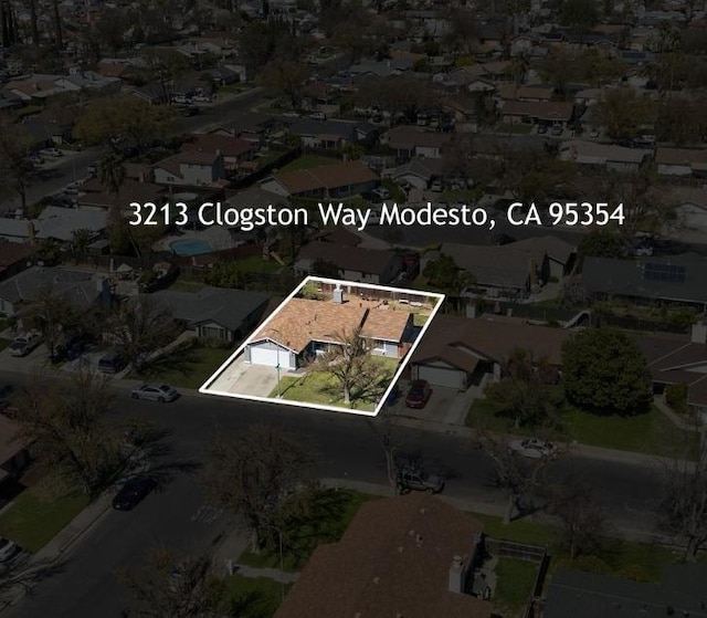 3213 Clogston Way, Modesto, CA 95354 - aerial view of residential area featuring property boundaries highlighted
