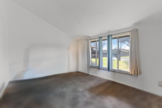 unfurnished room with concrete floors