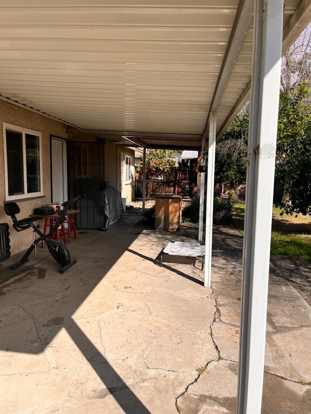 view of patio / terrace featuring a carport and grilling area