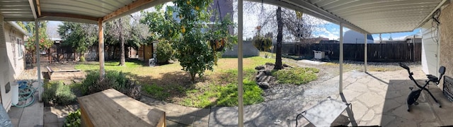 view of yard featuring a fenced backyard and a patio area