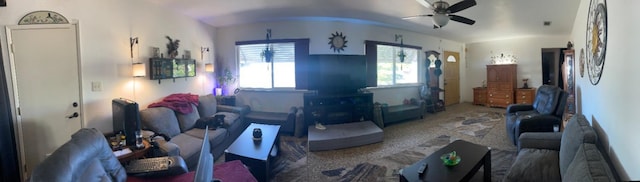 living area with ceiling fan