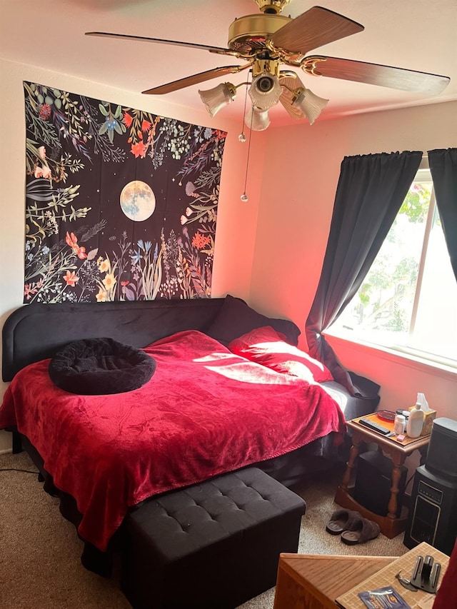 carpeted bedroom featuring a ceiling fan