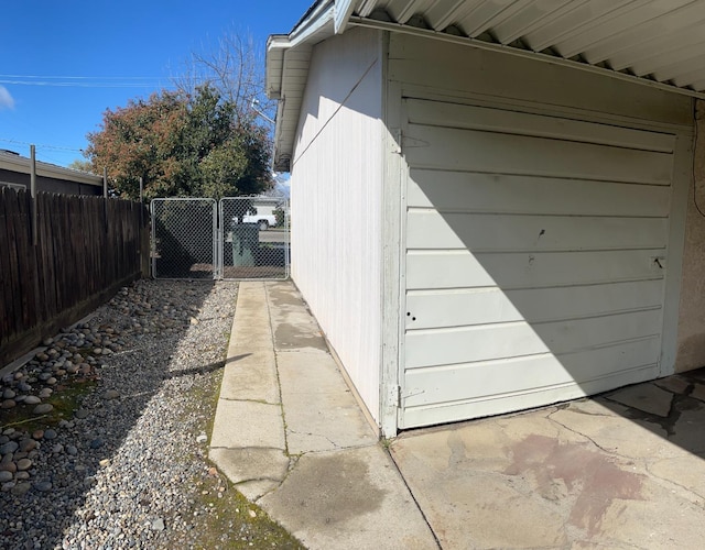 view of home's exterior featuring fence