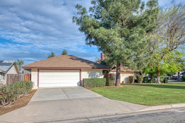 ranch-style home with concrete driveway, a garage, fence, and a front lawn