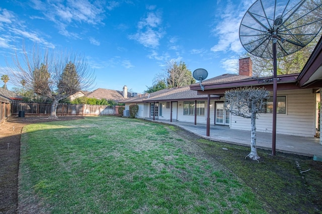 view of yard featuring a fenced backyard and a patio