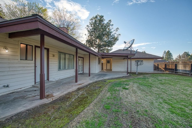 view of yard with a patio area and fence