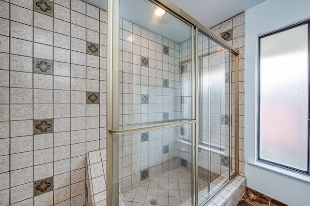 bathroom featuring a stall shower