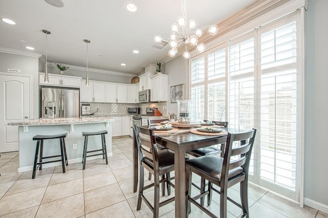 dining area featuring baseboards, an inviting chandelier, light tile patterned flooring, recessed lighting, and crown molding