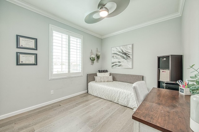 office featuring crown molding, wood finished floors, baseboards, and ceiling fan