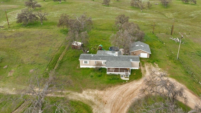 birds eye view of property featuring a rural view