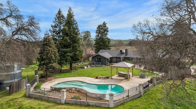 view of pool featuring a fenced in pool, fence, a gazebo, a yard, and a patio area